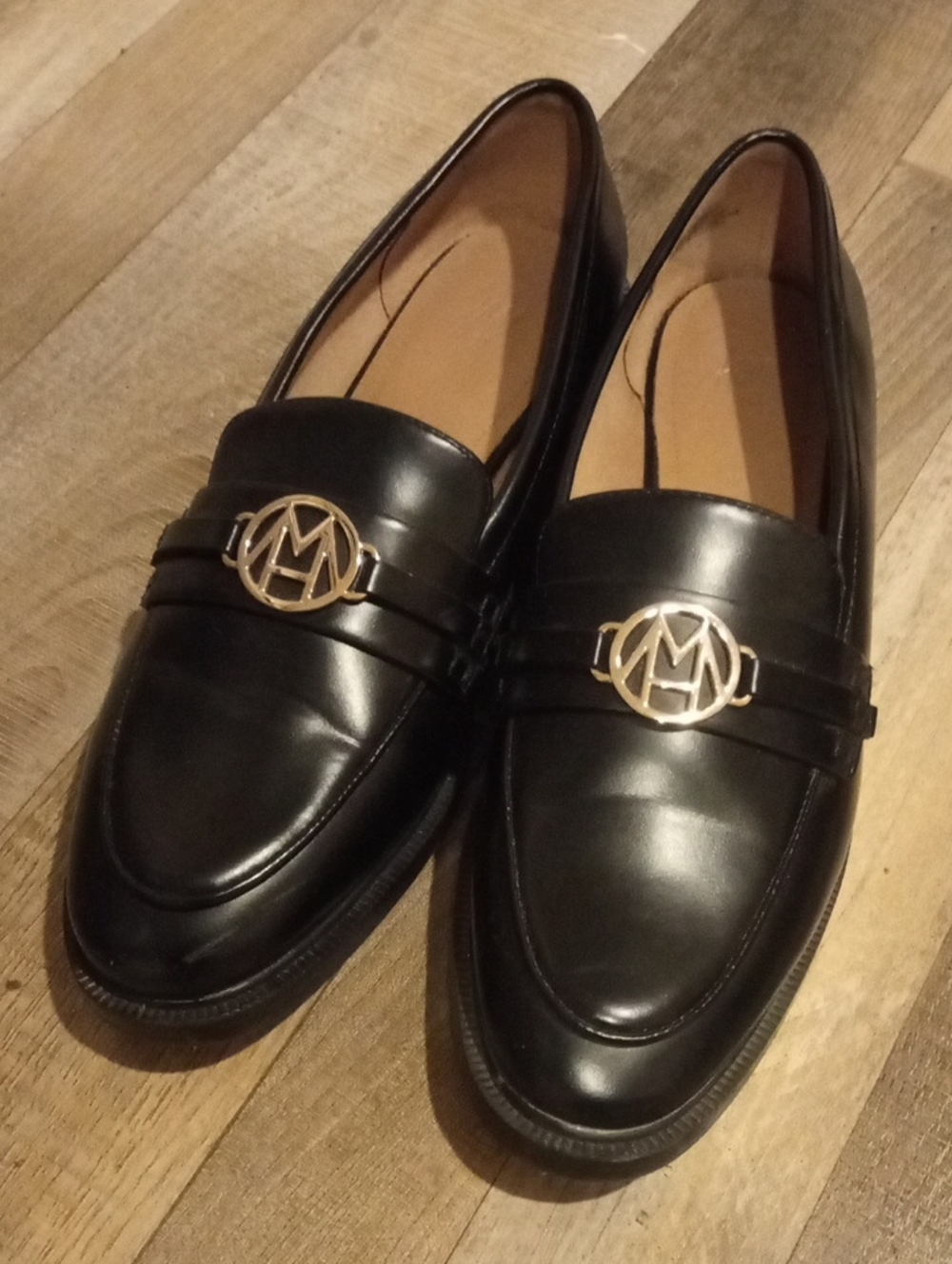 Women's black leather loafers
